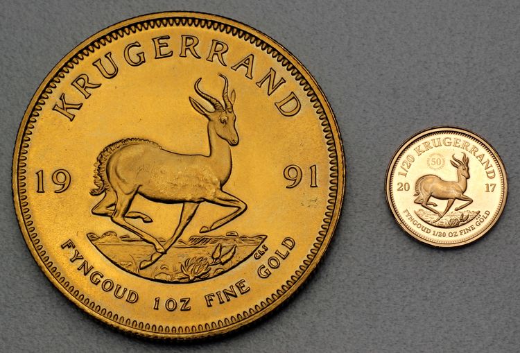 Grössenvergleich 1/20 Unzen Krügerrand zu einer ganzen Krügerrand Goldmünze